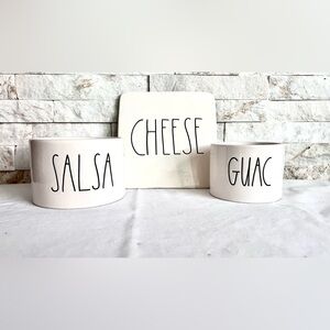 Rae Dunn bowls and cheese board.